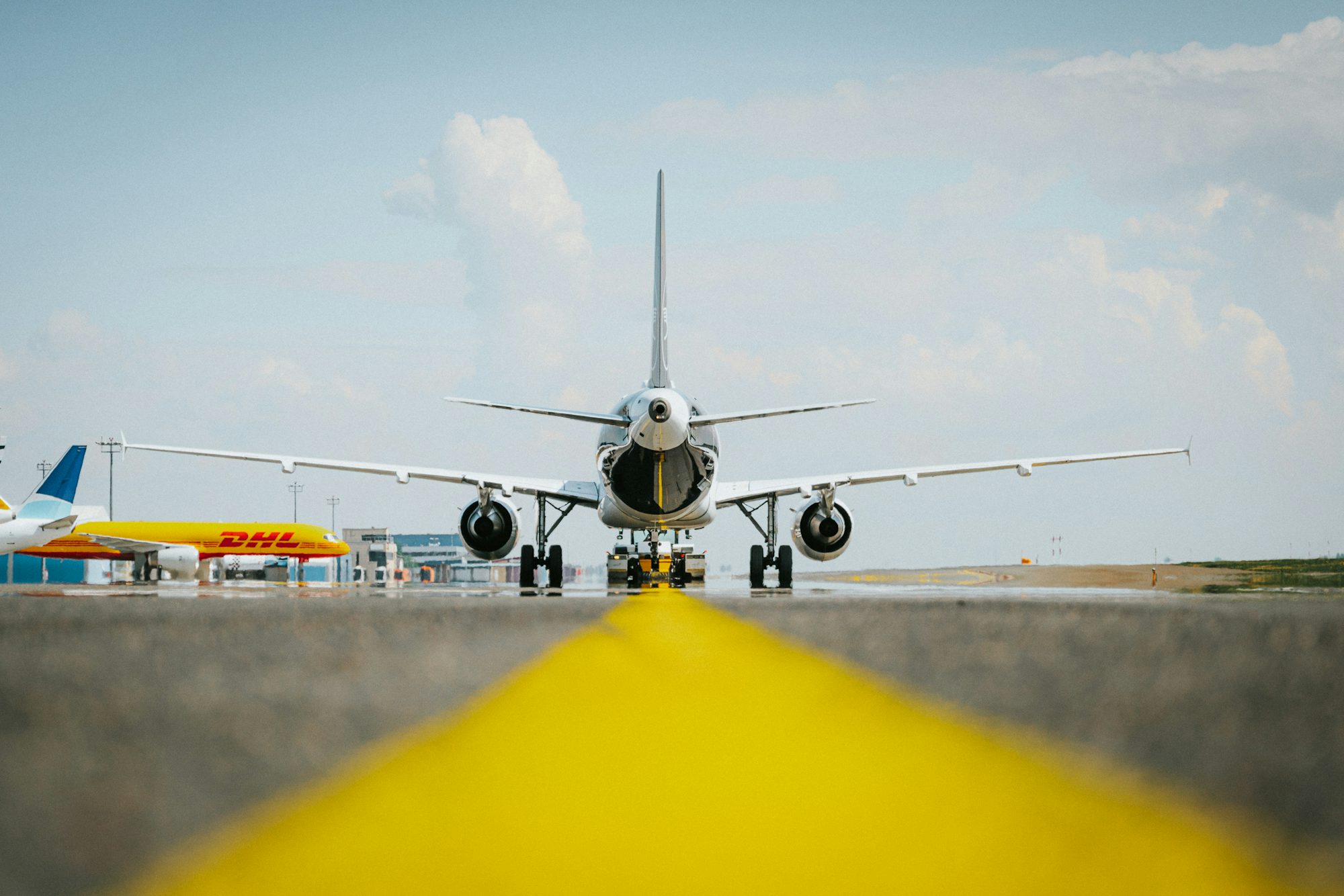 A commercial aircraft on the taxiway at an airport